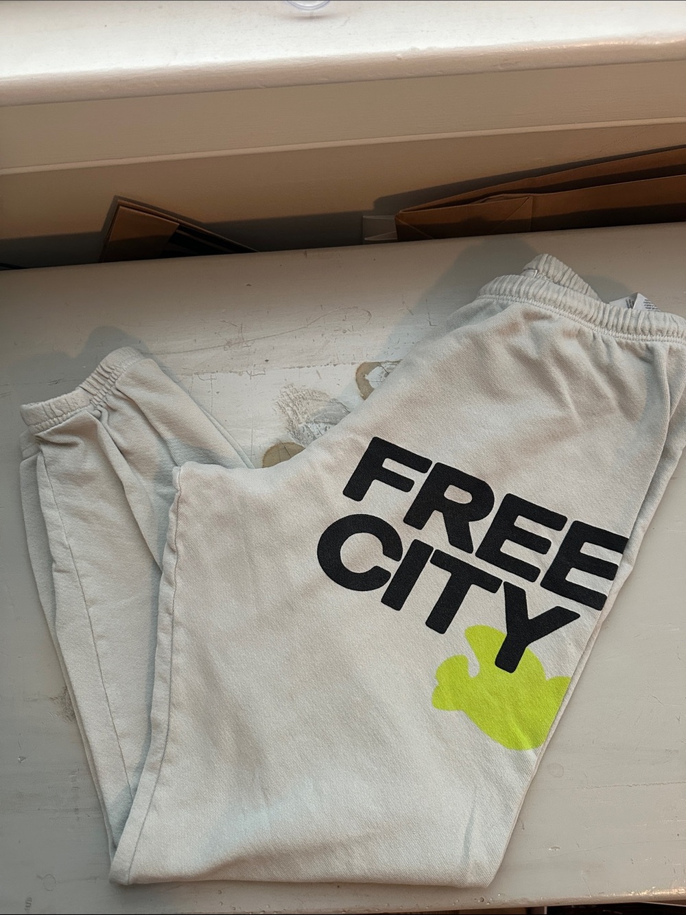 Free City Light Gray/Greenish Joggers with Black Logo & Neon Green Accent